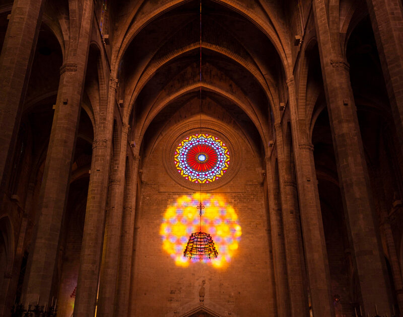 The reflection of the rose window results in a figure eight - the sign for infinity